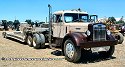 Nicely restored Autocar 6x4 semi-tractor with lowboy trailer