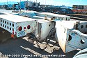 View from the rear of the heavy-haul lowboy unit.  The very rear unit on right side of photo<br>
				  is called a stinger, and pivots separately from the lowboy bed unit to assist in turning.  Here you can get a better idea<br>
				  of how the stinger attaches to the lowboy bed unit