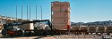 Transformer being moved off the heavy-duty rail flatcar and 
                    onto Emmert's heavy-duty dollies