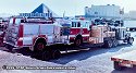 Fire Truck and equipment on Heavy-Duty Dropdeck Trailer, photographed at a Las Vegas area truck stop around 1996