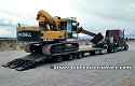 Freightliner with Heavy-Duty Dropdeck and Gradall Excavator