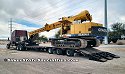 Freightliner with Heavy-Duty Dropdeck and Gradall Excavator