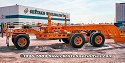 These heavy-haul lowboy trailers were set aside after unloading construction equipment