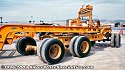 These heavy-haul lowboy trailers were set aside after unloading construction equipment