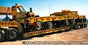 A heavy-haul trailer unit custom-built by Jake's Crane for really specialized heavy haulage, note the steering cab for the rear trailer unit.<br>
				  The rear trailer unit is loaded on the primary trailer for empty transport back to base