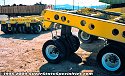 A special-purpose heavy-haul dolly unit, which can raise or lower via hydraulic controls