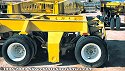 A special-purpose heavy-haul dolly unit, which can raise or lower via hydraulic controls