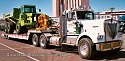Kenworth with Terex articulated dump truck on Lowboy Trailer, at Mine Expo 1996