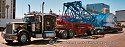 Peterbilt with lowboy setup transporting crawler crane