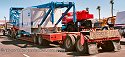 Peterbilt with lowboy setup transporting crawler crane